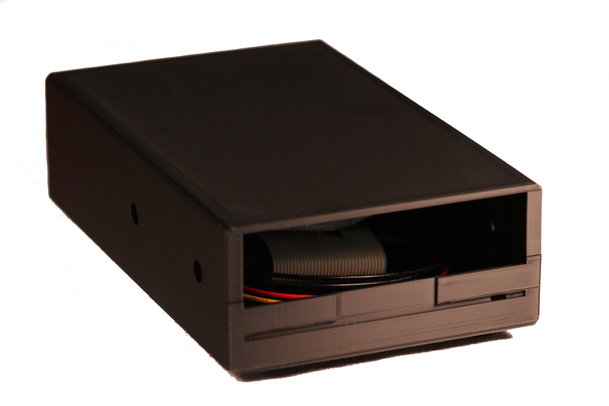 Greaseweazle v4.1 mounted in 3.5" drive enclosure